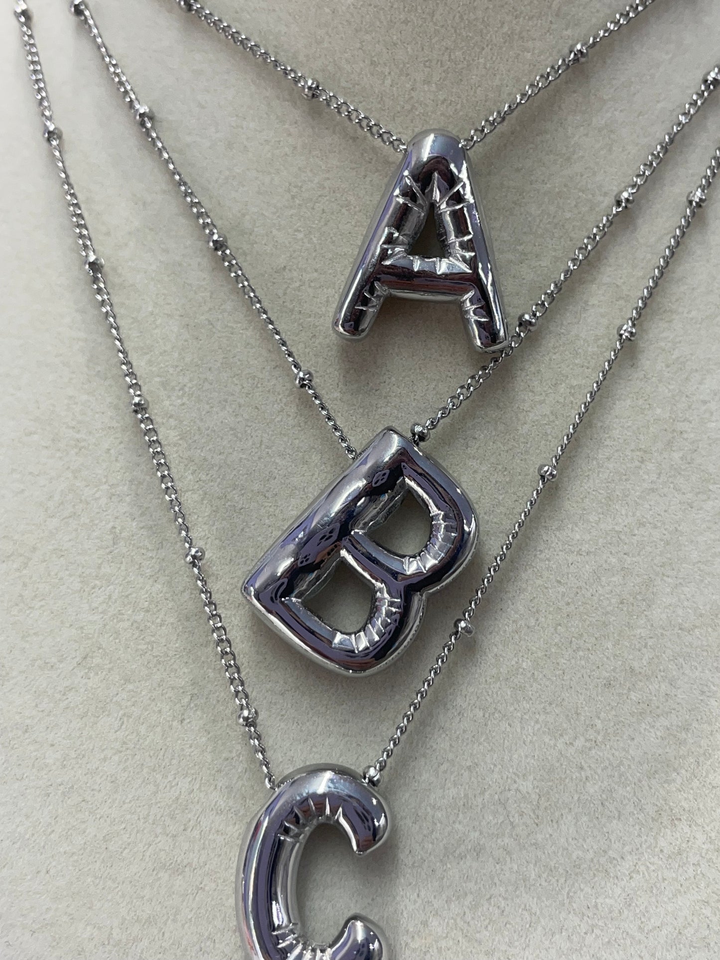 INICIAL SILVER BUBBLES