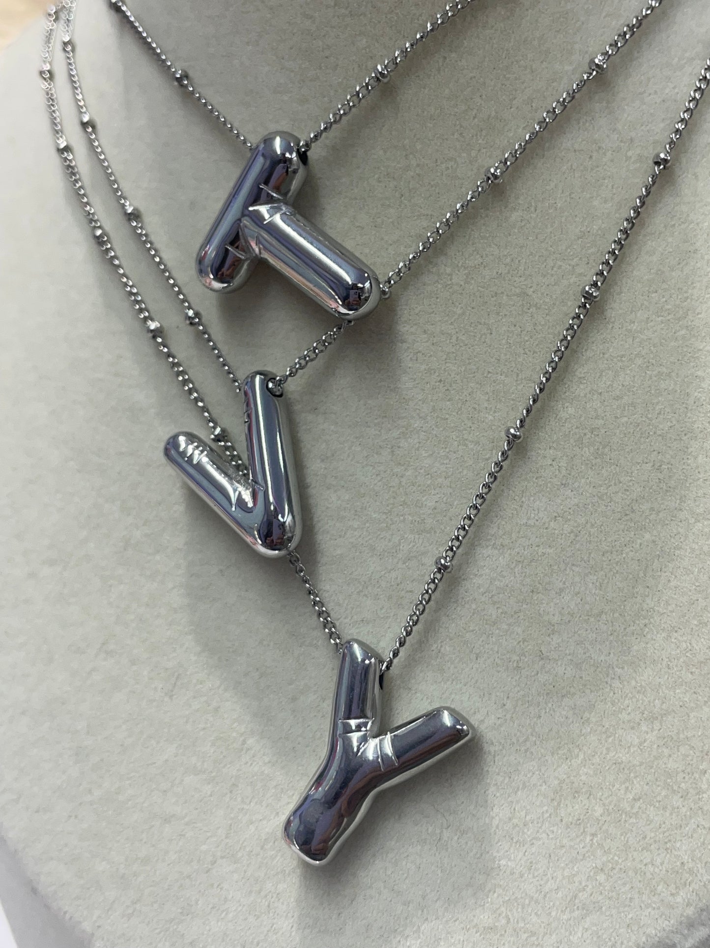 INICIAL SILVER BUBBLES